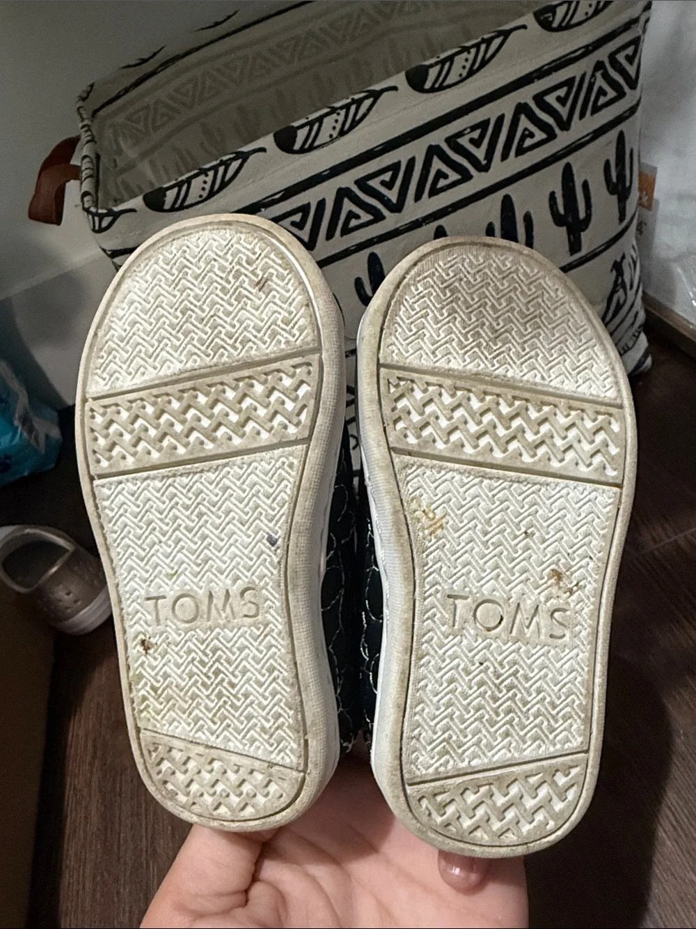 TOMS Kids Black Slip-On Shoes with White Floral Stitching